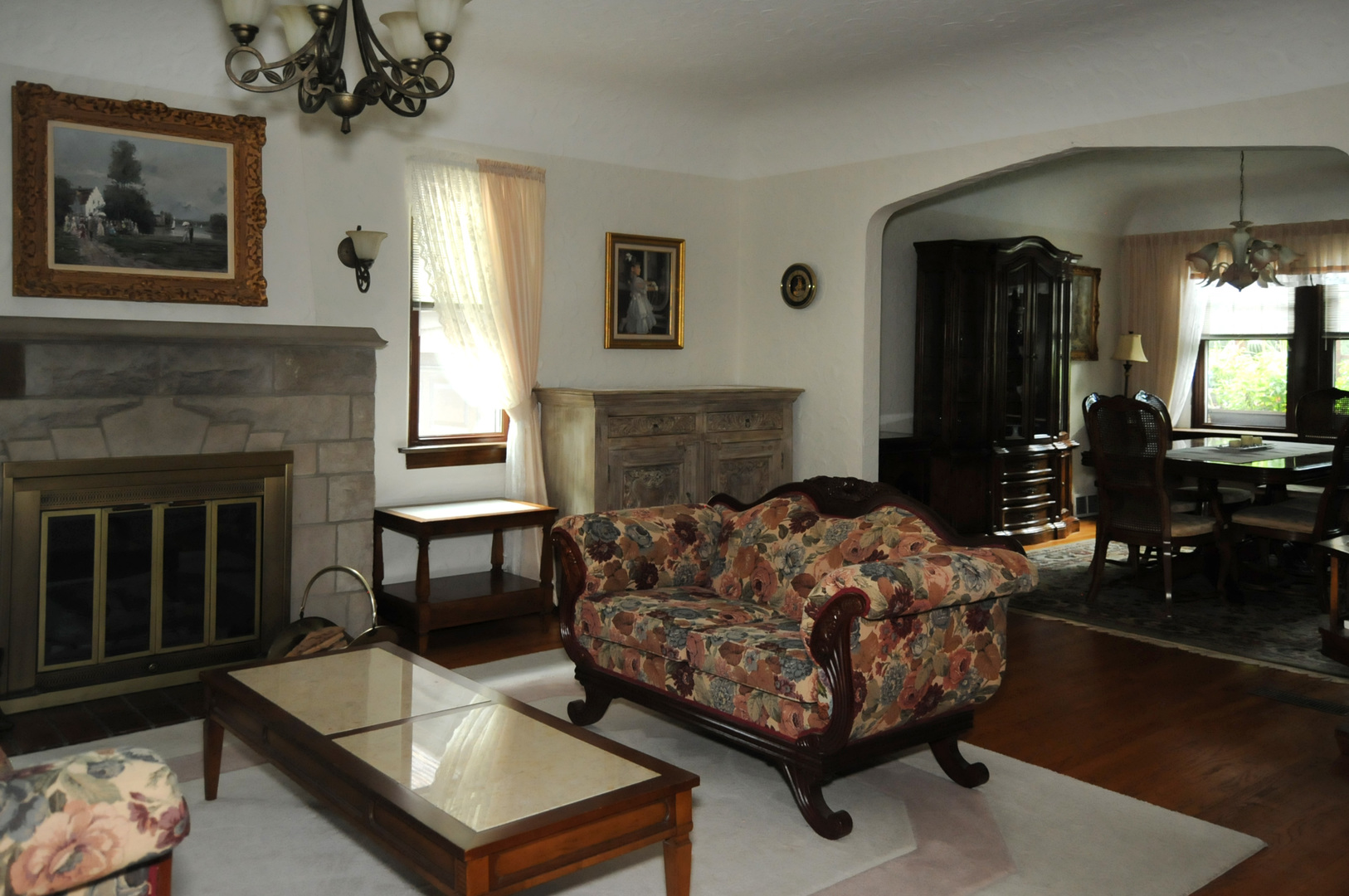 526 Longcommon Road Riverside, IL 60546 - Photo 15 of 40 a living room with furniture and a fireplace