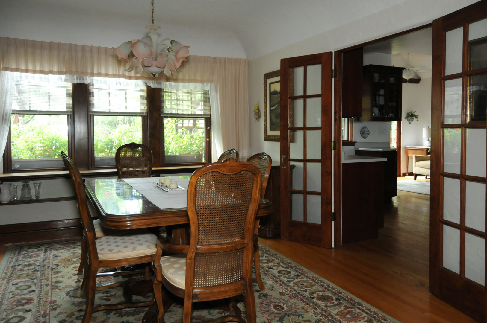 526 Longcommon Road Riverside, IL 60546 - Photo 16 of 40 a view of a dining room with furniture window and wooden floor