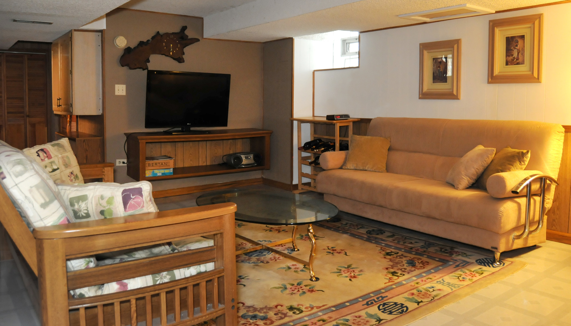 526 Longcommon Road Riverside, IL 60546 - Photo 25 of 40 a living room with furniture and a flat screen tv
