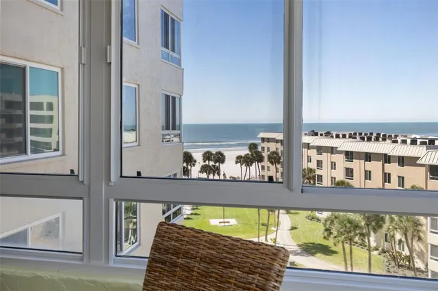 a view of swimming pool from a balcony
