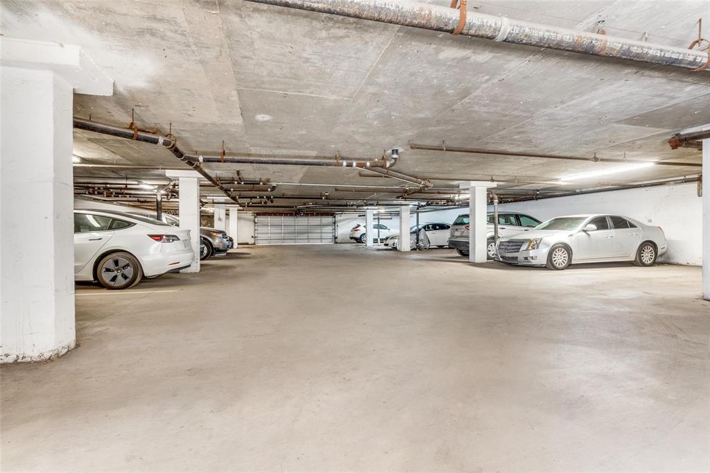 4221 Cole Avenue, Unit 103 Dallas, TX 75205 - Photo 14 of 17 a view of parking with cars parked