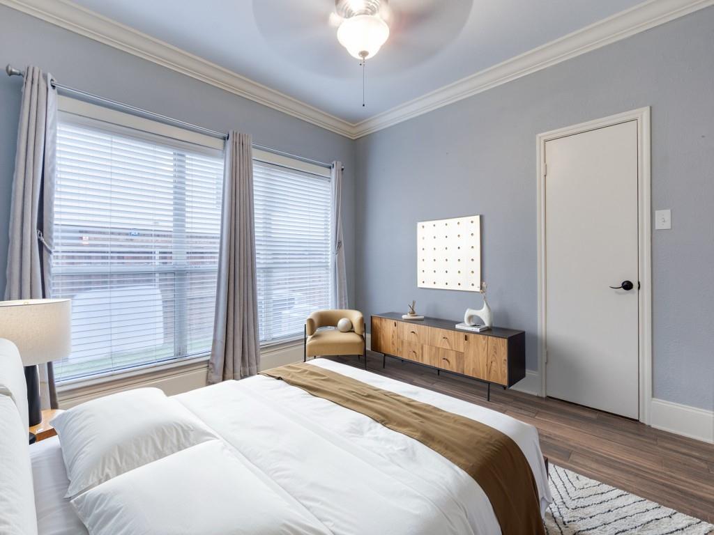 4221 Cole Avenue, Unit 103 Dallas, TX 75205 - Photo 9 of 17 a bedroom with a bed and a window