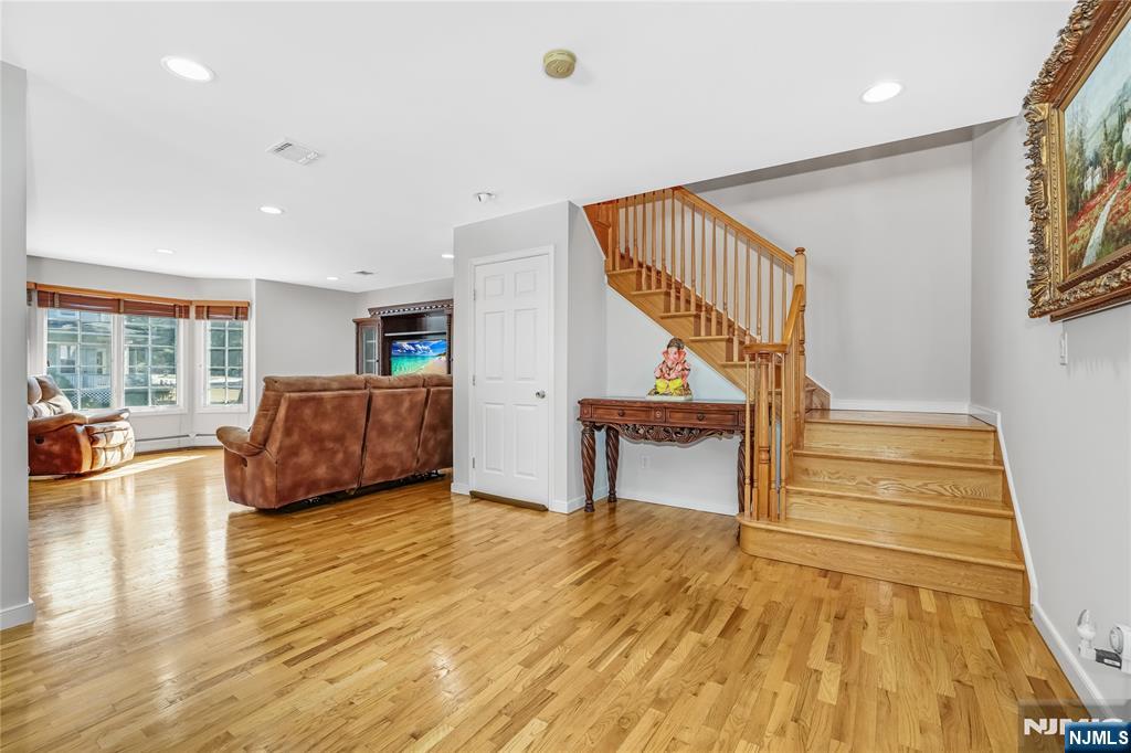 4 Maple Avenue Waldwick, NJ 07463 - Photo 14 of 34 a living room with furniture and a wooden floor
