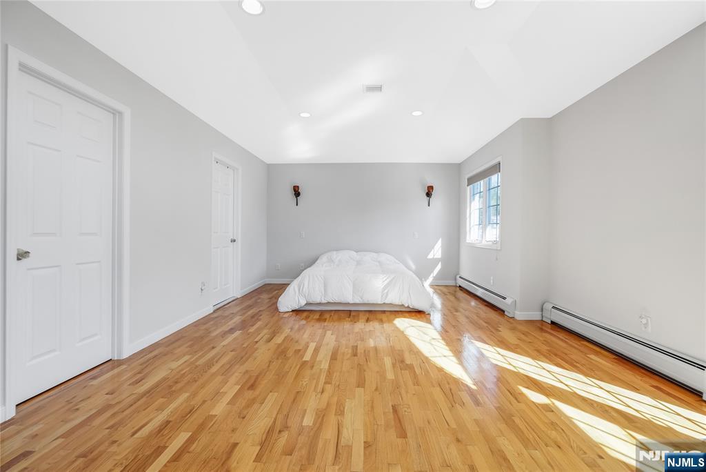 4 Maple Avenue Waldwick, NJ 07463 - Photo 15 of 34 a view of a room with wooden floor and staircase