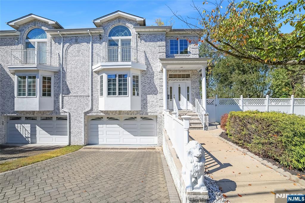 4 Maple Avenue Waldwick, NJ 07463 - Photo 2 of 34 a front view of a house with a yard