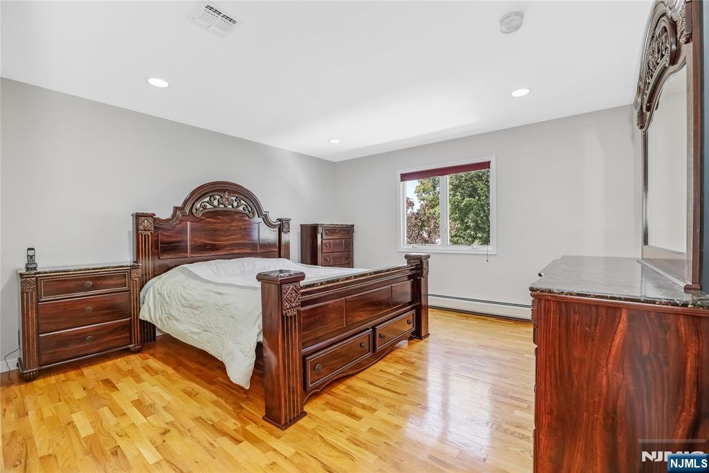 4 Maple Avenue Waldwick, NJ 07463 - Photo 21 of 34 a bedroom with a bed and a window