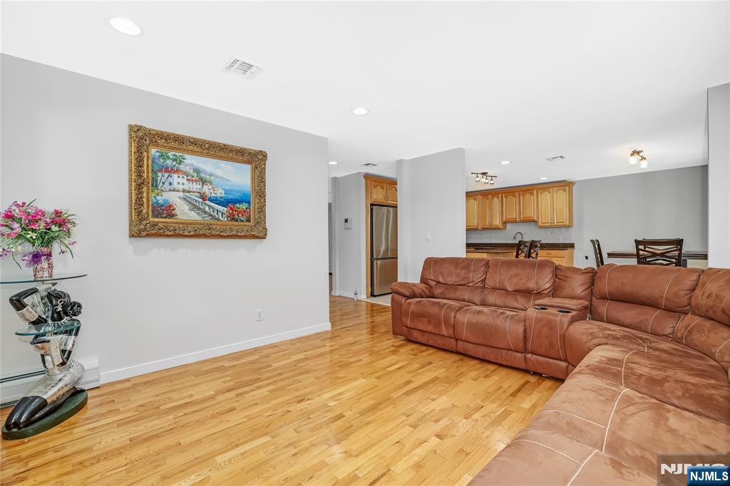 4 Maple Avenue Waldwick, NJ 07463 - Photo 7 of 34 a living room with furniture and a potted plant