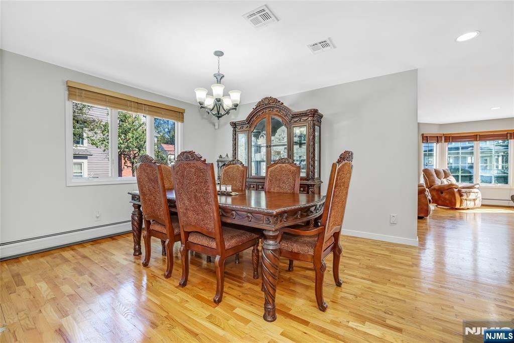 4 Maple Avenue Waldwick, NJ 07463 - Photo 8 of 34 a view of a dining room with furniture window and wooden floor