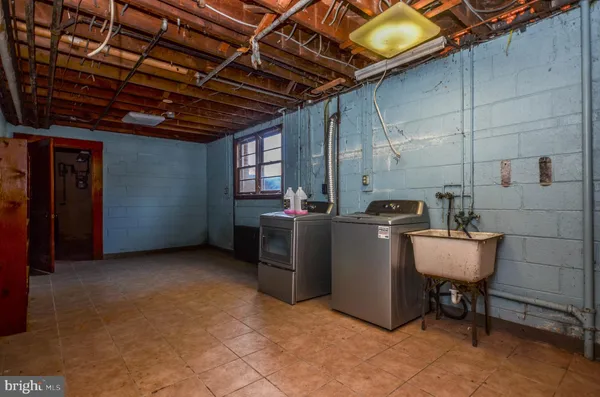 a view of swimming pool with outdoor seating