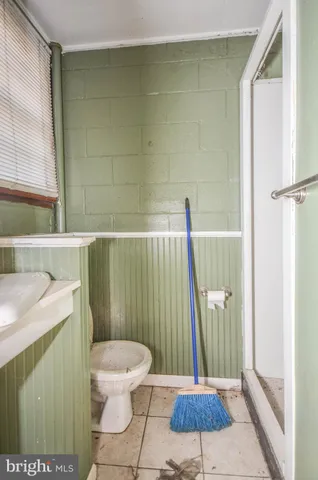 a view of swimming pool with outdoor seating