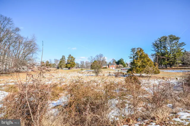 a view of a house with a big yard