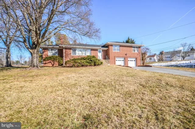 a house view with a backyard space