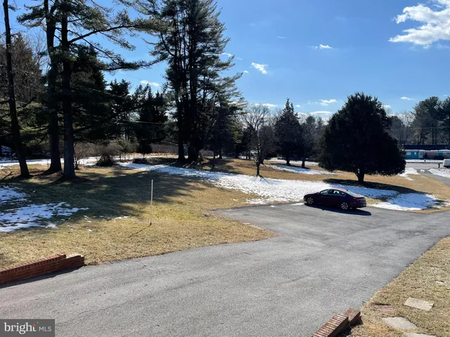 a view of a golf course with a garden