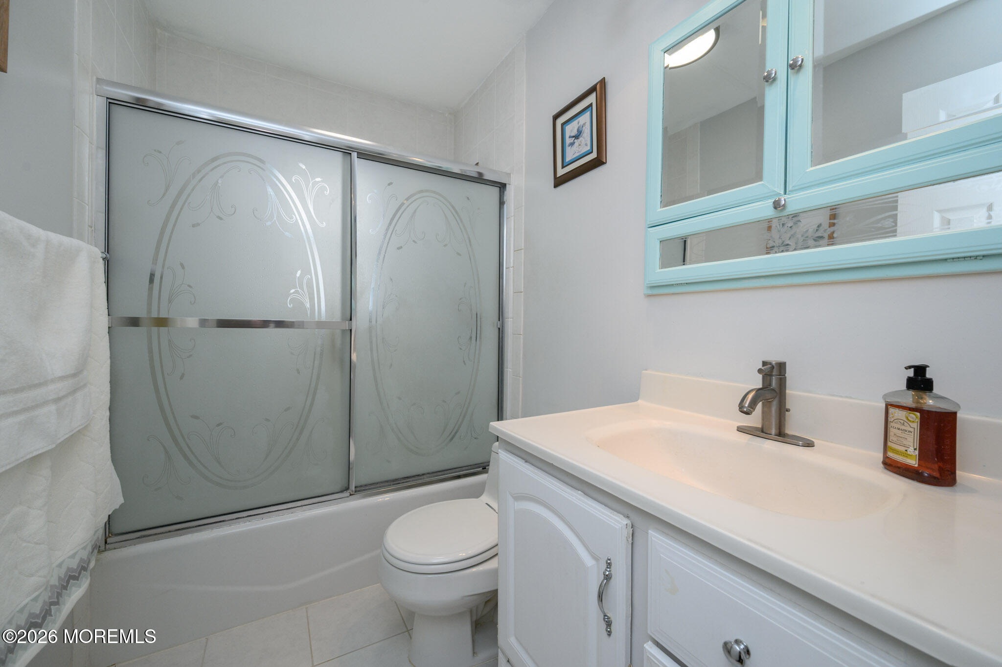 96 Cooper Boulevard Red Bank, NJ 07701 - Photo 11 of 26 a bathroom with a sink a toilet and shower