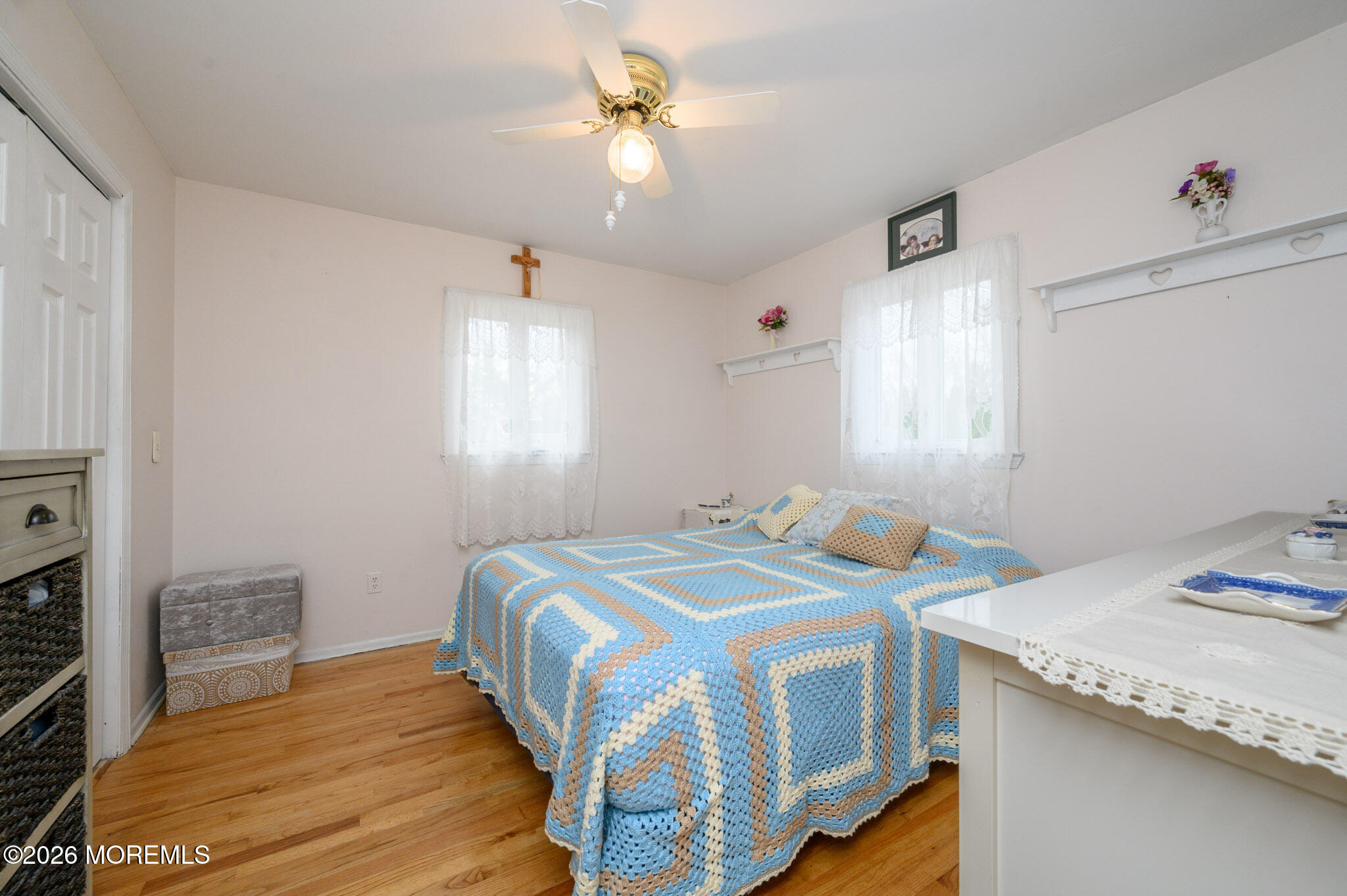 96 Cooper Boulevard Red Bank, NJ 07701 - Photo 12 of 26 a bedroom with a bed and a window