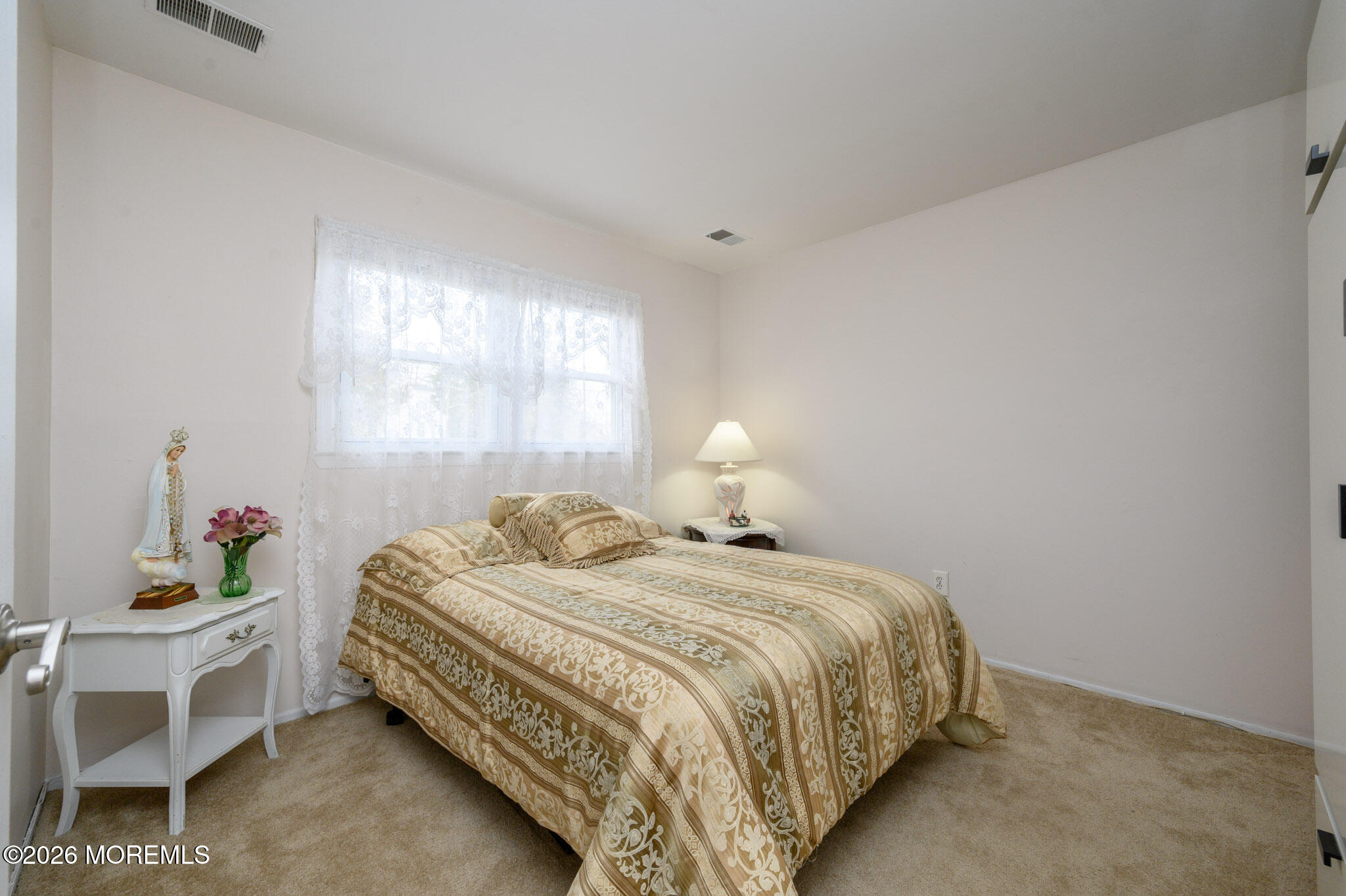 96 Cooper Boulevard Red Bank, NJ 07701 - Photo 16 of 26 a bedroom with a bed and a window