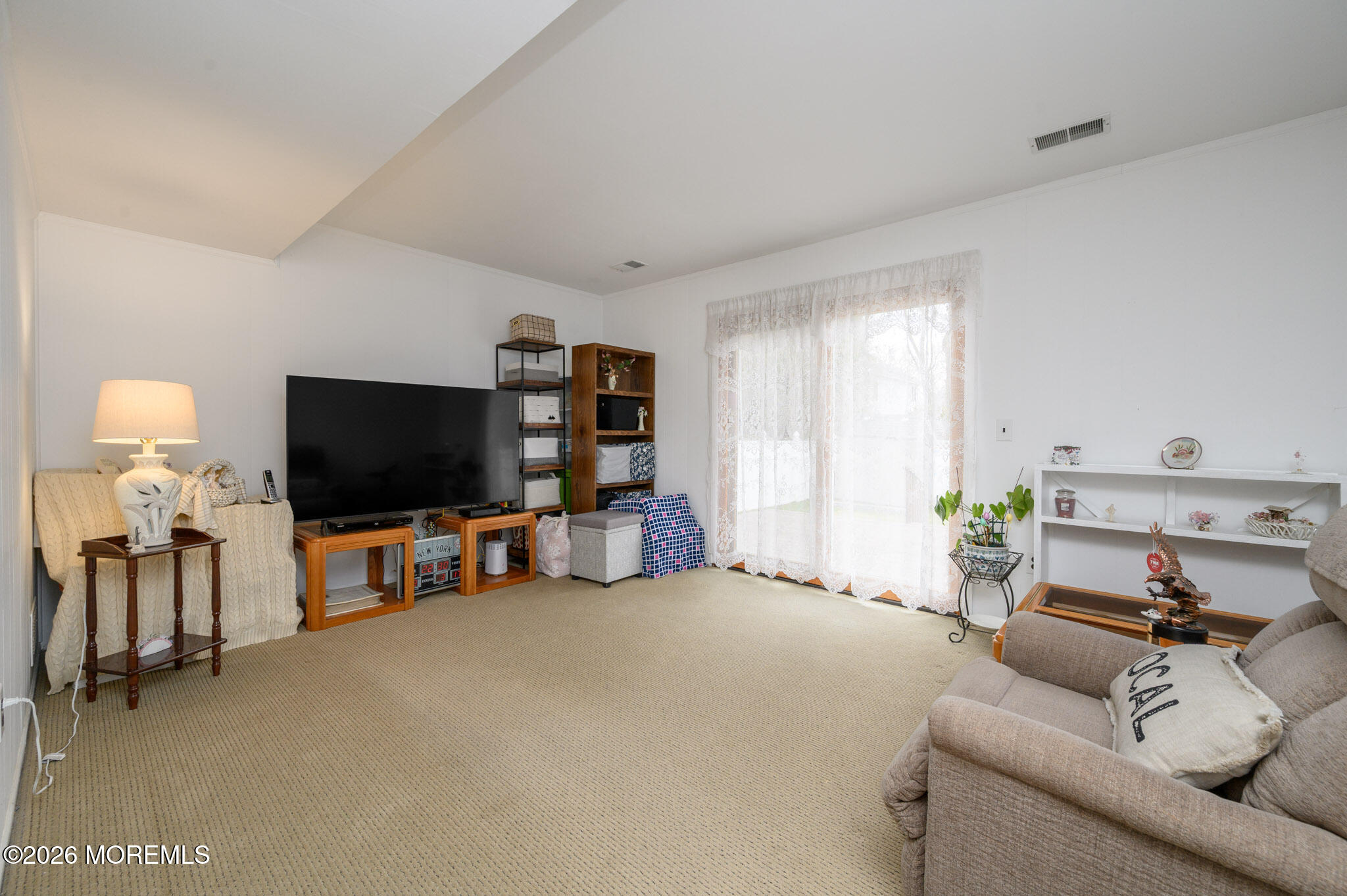 96 Cooper Boulevard Red Bank, NJ 07701 - Photo 18 of 26 a living room with furniture and a flat screen tv