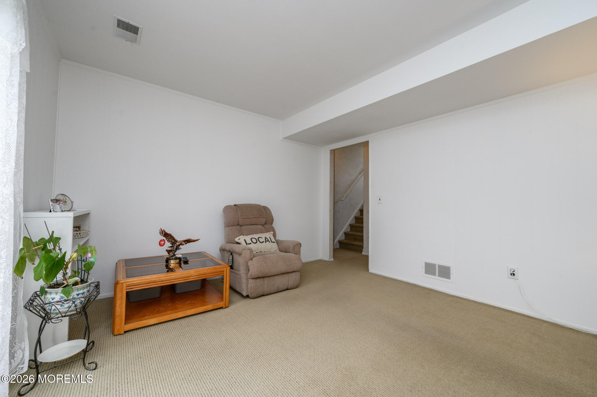 96 Cooper Boulevard Red Bank, NJ 07701 - Photo 19 of 26 a bedroom with furniture and a potted plant