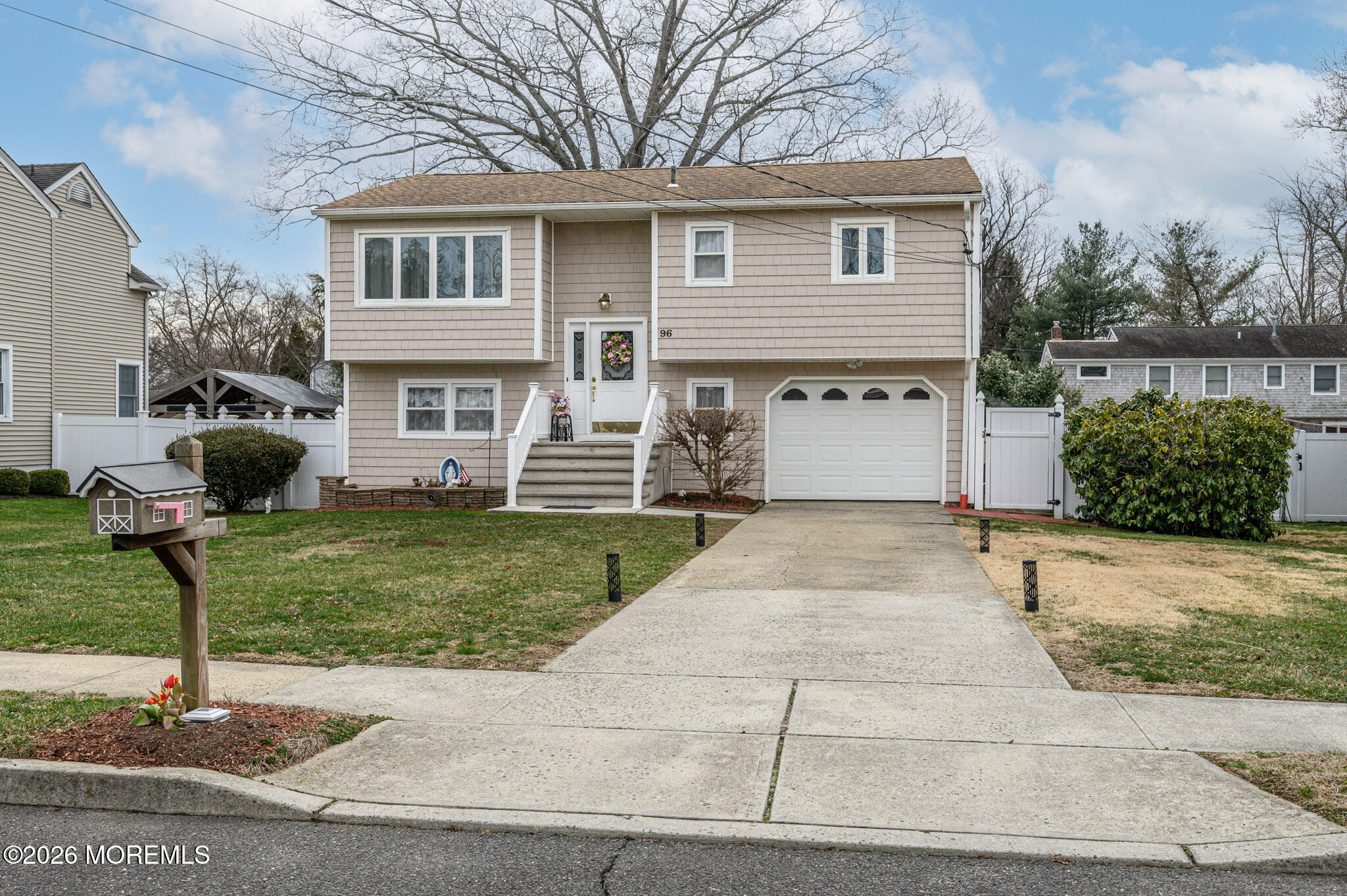 96 Cooper Boulevard Red Bank, NJ 07701 - Photo 26 of 26 a front view of a house with a yard