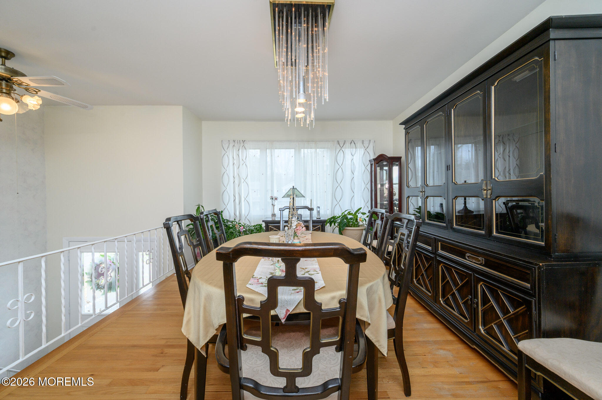 96 Cooper Boulevard Red Bank, NJ 07701 - Photo 4 of 26 a view of a dining room with furniture window and wooden floor
