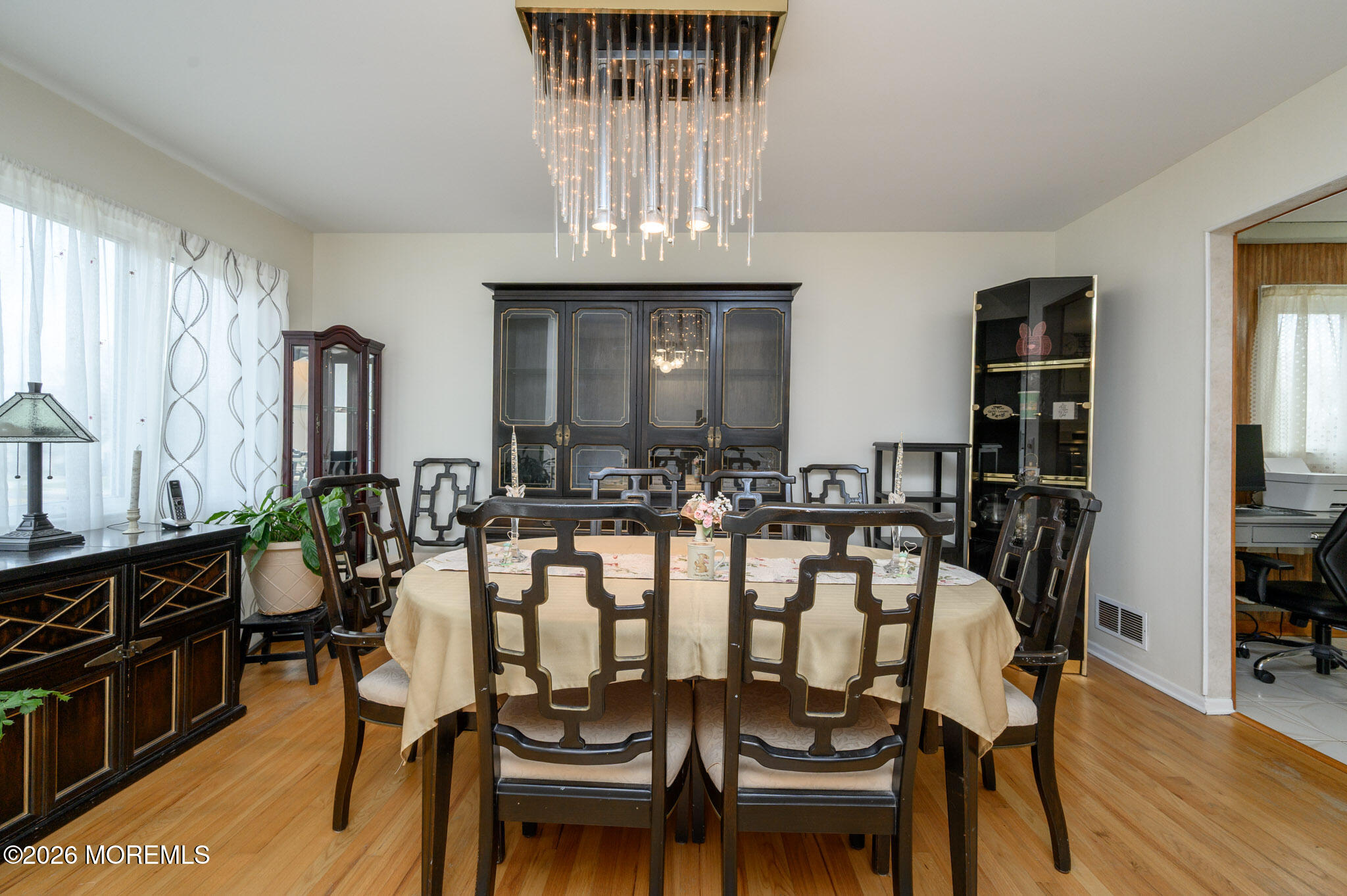 96 Cooper Boulevard Red Bank, NJ 07701 - Photo 6 of 26 a view of a dining room with furniture and wooden floor