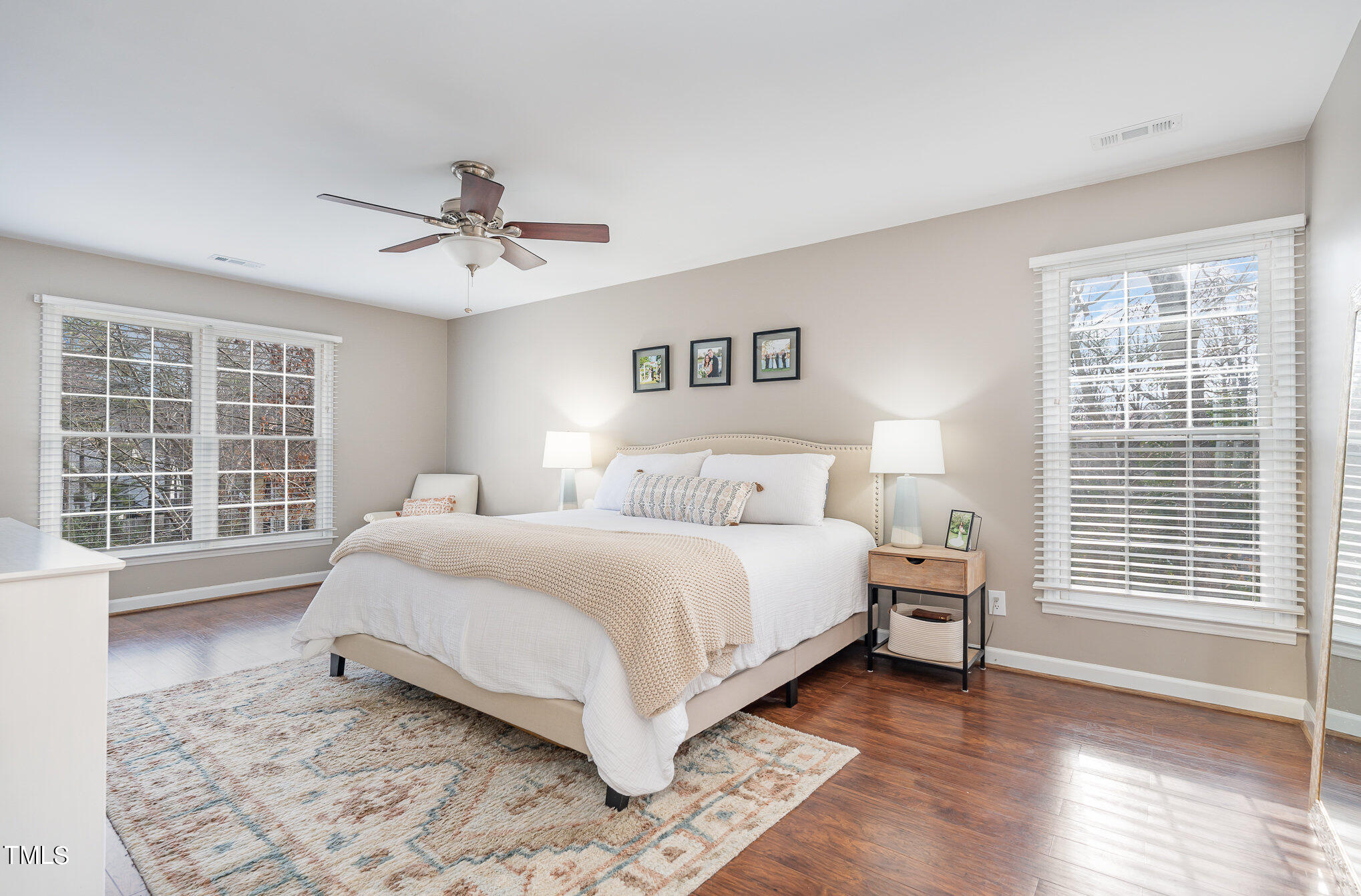 7301 Old Hundred Road Raleigh, NC 27613 - Photo 8 of 17 a bedroom with a large bed and a window