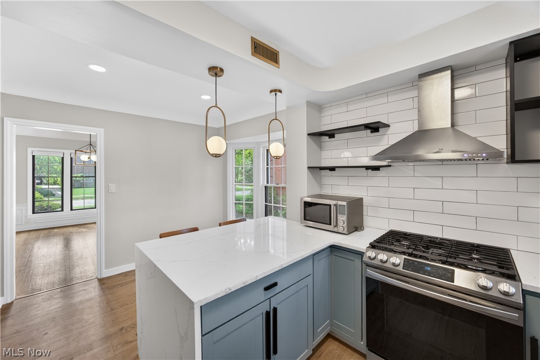 2561 Charney Road Cleveland, OH 44118 - Photo 13 of 47 The Kitchen has easy access to the Dining Room in the background