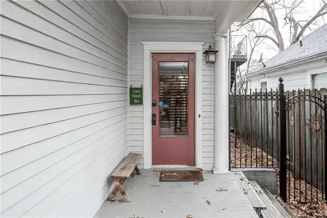 a view of a door and a window