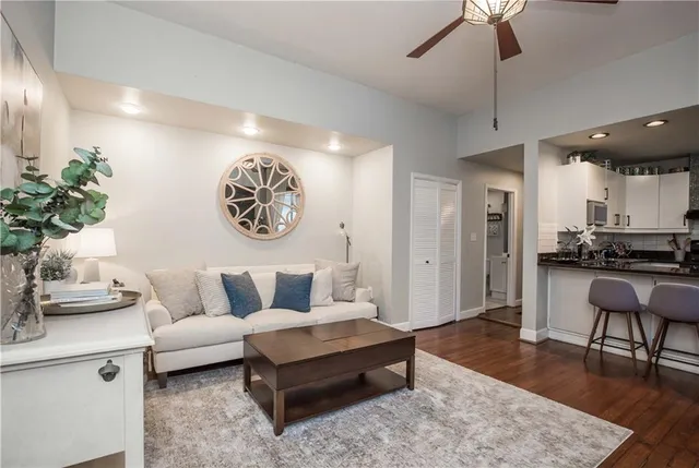a living room with furniture and a table