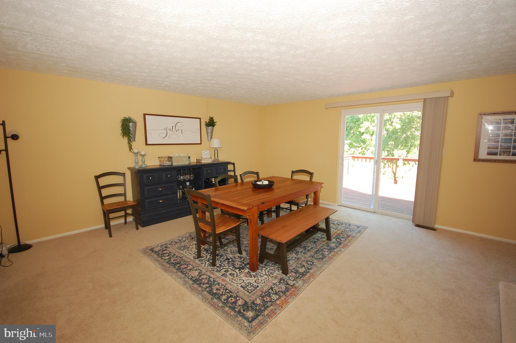 7975 Millstream Court Elkridge, MD 21075 - Photo 4 of 15 Combination Living/Dining Area with slider to Deck