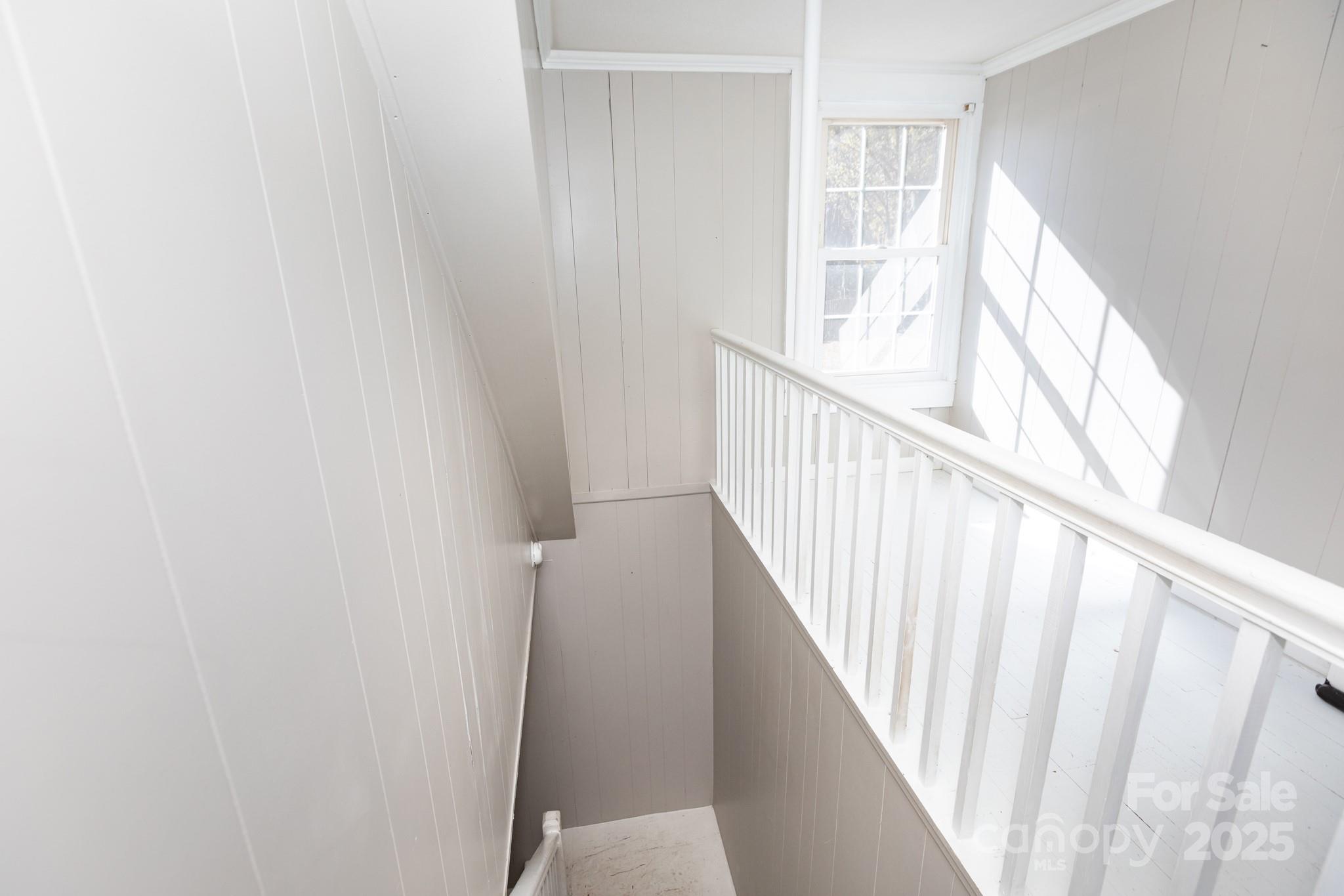 1402 Brantley Road Kannapolis, NC 28083 - Photo 17 of 24 a view of staircase with wooden floor and white walls
