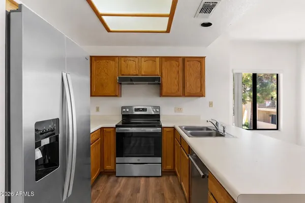 a view of a kitchen with cabinets