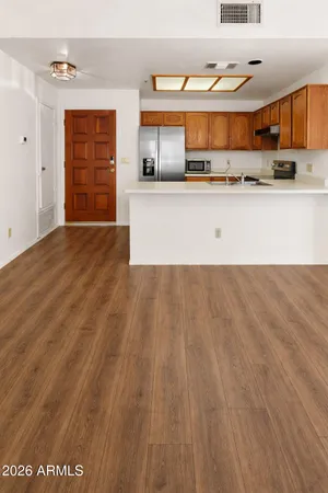 a view of a bathroom from a hallway