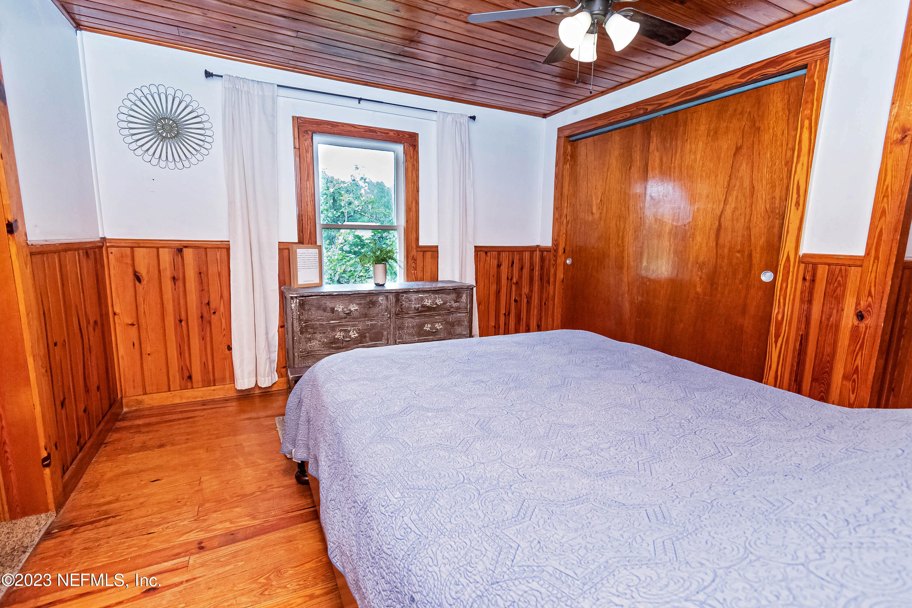 8619 Mud Lake Road Macclenny, FL 32063 - Photo 17 of 49 a bedroom with a bed and a window