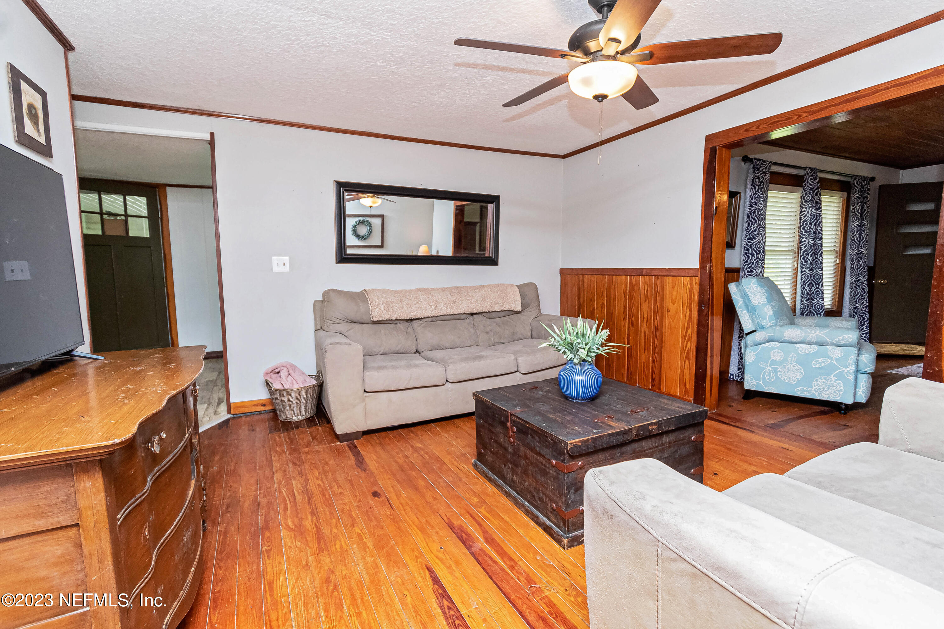 8619 Mud Lake Road Macclenny, FL 32063 - Photo 6 of 49 a living room with furniture and a wooden floor