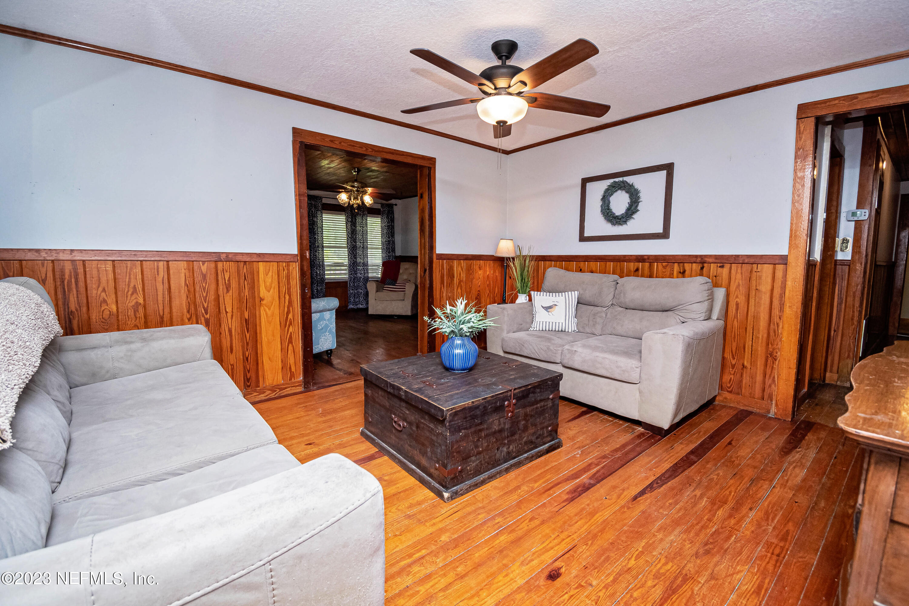 8619 Mud Lake Road Macclenny, FL 32063 - Photo 7 of 49 a living room with furniture and wooden floor