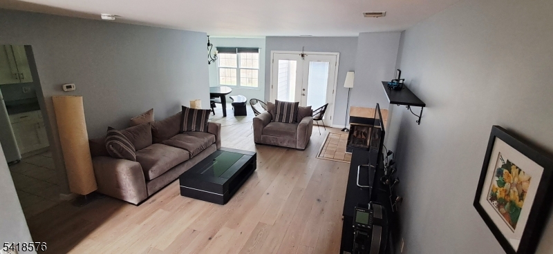 15 Andover Circle Princeton, NJ 08540 - Photo 5 of 16 a living room with furniture and a flat screen tv