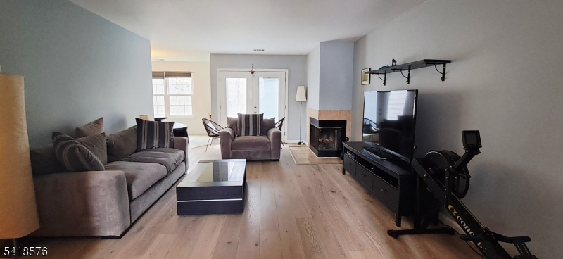 15 Andover Circle Princeton, NJ 08540 - Photo 7 of 16 a living room with furniture and a flat screen tv