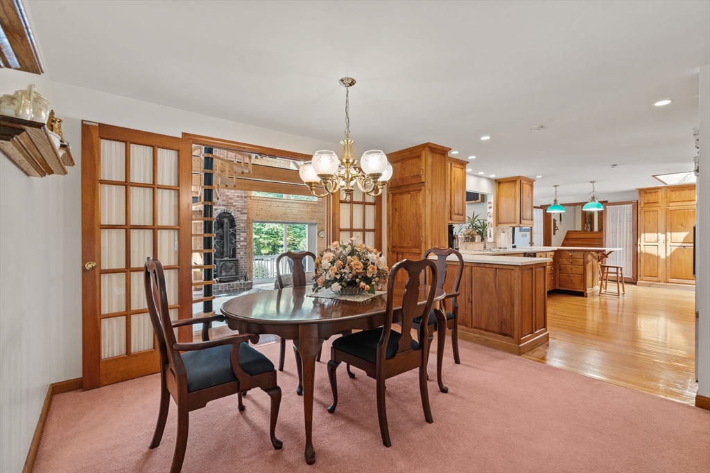 3 Summit Groton, MA 01450 - Photo 13 of 38 a view of a dining room with furniture window and outside view