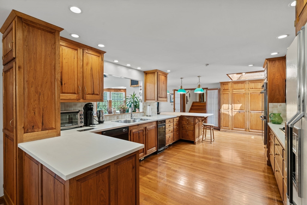 3 Summit Groton, MA 01450 - Photo 15 of 38 a kitchen with stainless steel appliances a sink and a refrigerator