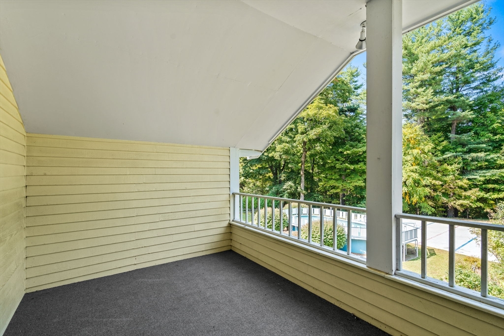 3 Summit Groton, MA 01450 - Photo 24 of 38 a view of a balcony with lake view