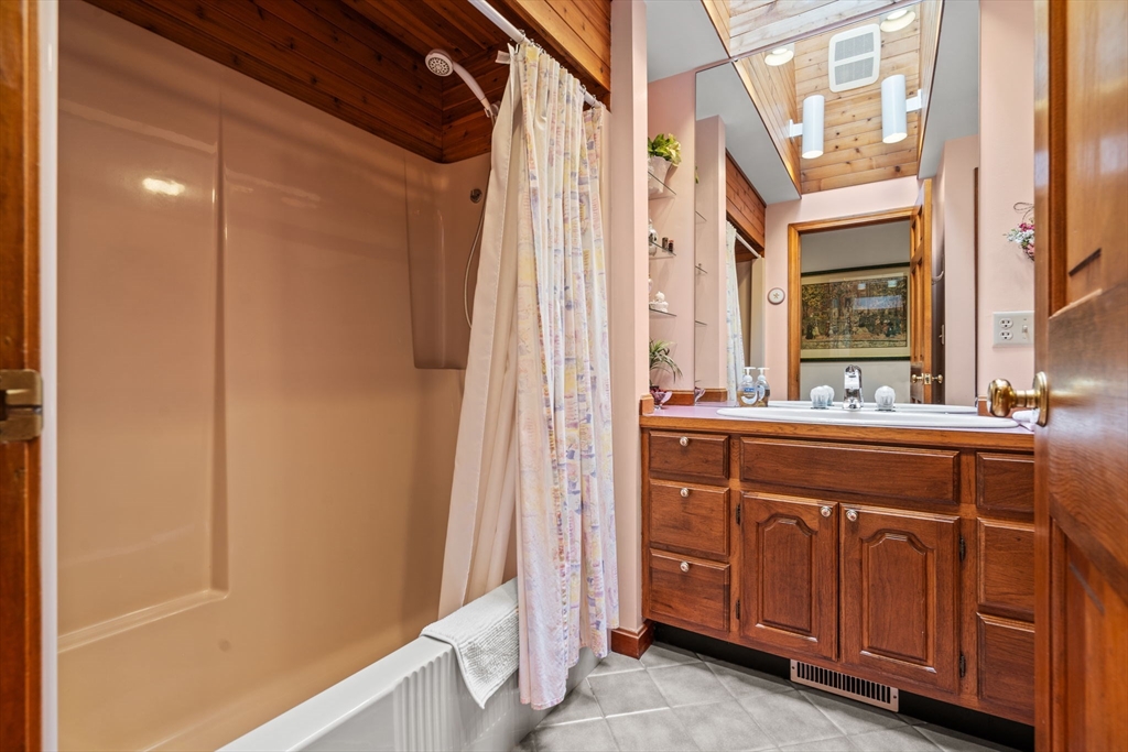 3 Summit Groton, MA 01450 - Photo 27 of 38 a bathroom with a sink and a mirror