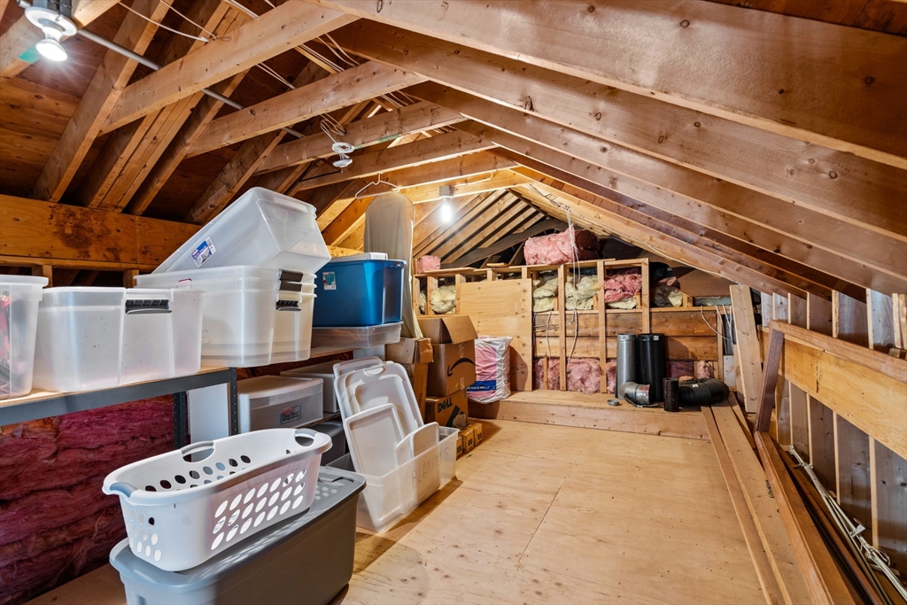 3 Summit Groton, MA 01450 - Photo 32 of 38 a view of a patio with a table and chairs