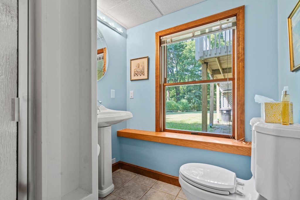 3 Summit Groton, MA 01450 - Photo 35 of 38 a bathroom with a toilet sink and window