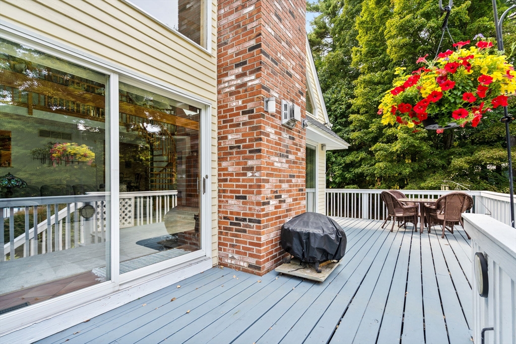 3 Summit Groton, MA 01450 - Photo 10 of 38 a view of balcony with furniture and garden