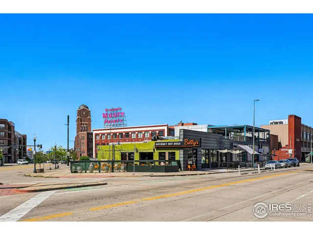 a view of a building with a street
