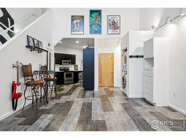 a view of livingroom with furniture and flat screen tv