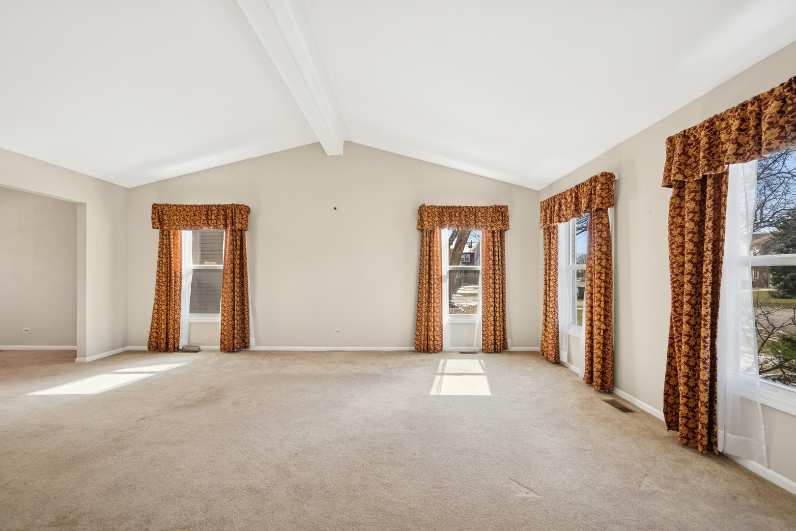 1005 Honeysuckle Drive Wheeling, IL 60090 - Photo 2 of 25 a view of an empty room with a window