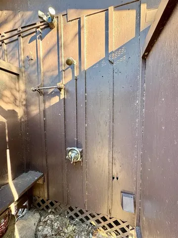 a view of backyard with wooden deck