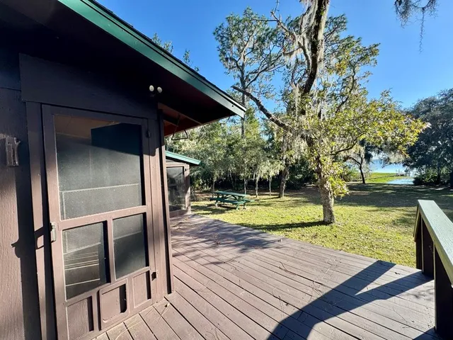 a view of swimming pool with sitting area